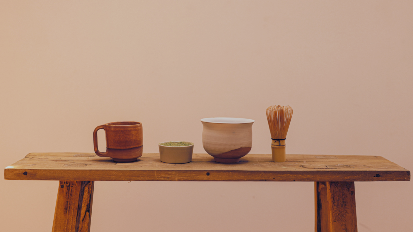 Teaware items on a wooden table